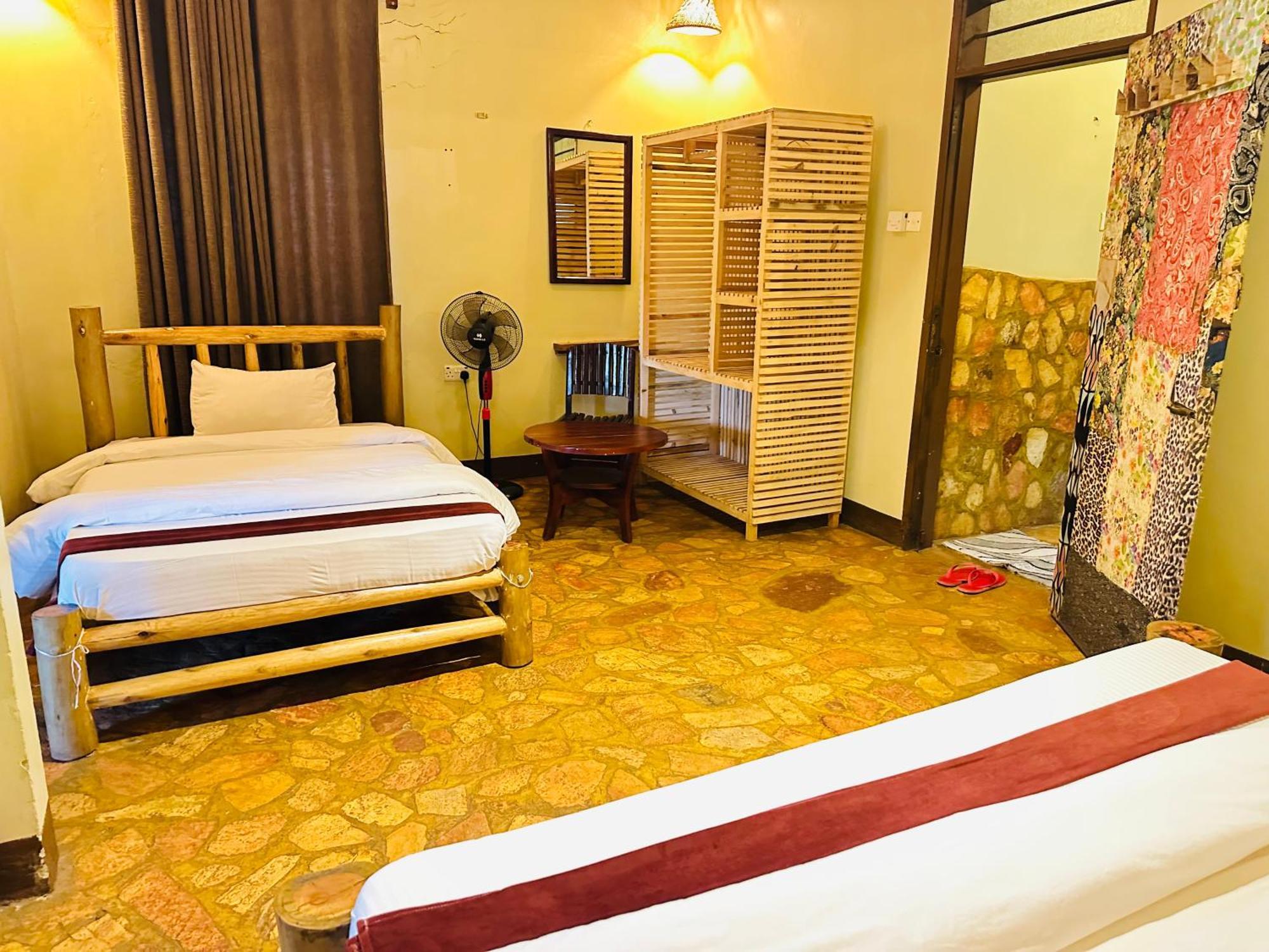 Afro Smile Hotel & Guest House Jinja Extérieur photo